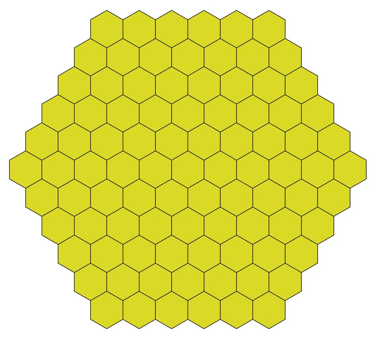 Big yellow hexagon composed by smaller yellow hexagins forming a honeycomb shape