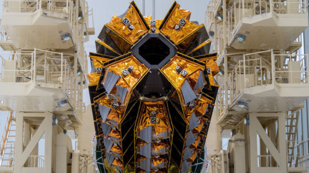 A cluster of OneWeb satellites being prepared to louche.