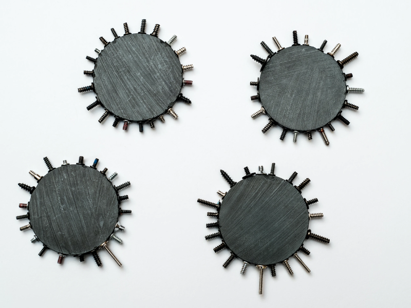 AI-Driven Discovery of Critical-Element-Free Magnetic Materials