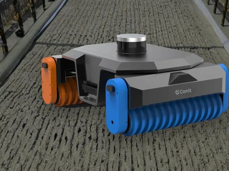 A Robot Designed to Enhance Structural Strength Leaves its Imprint in Wet Concrete