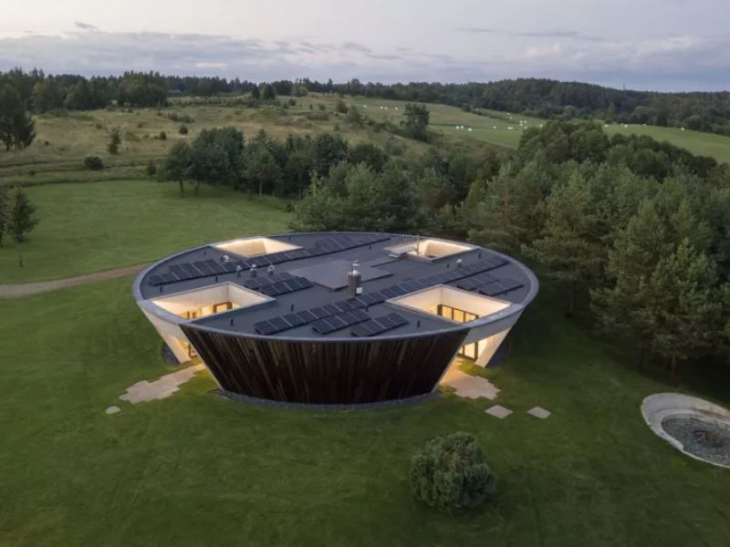 Circular Home Designed Around a Series of Sunken Courtyards