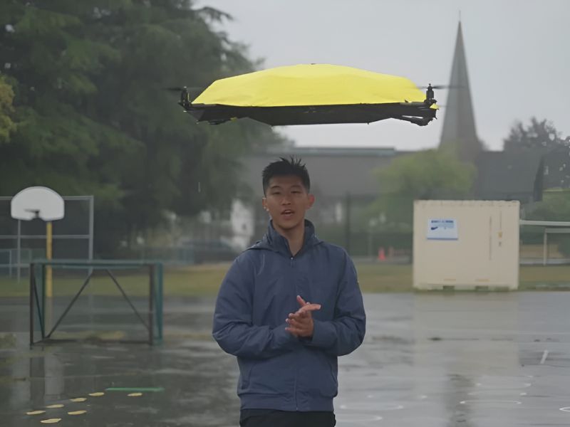 A Floating Umbrella Trails the User as they Walk in the Rain