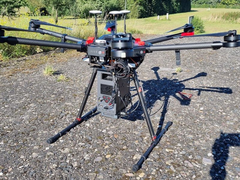 Rapid, Accurate Radioactive Material Localization With Drones and Robots